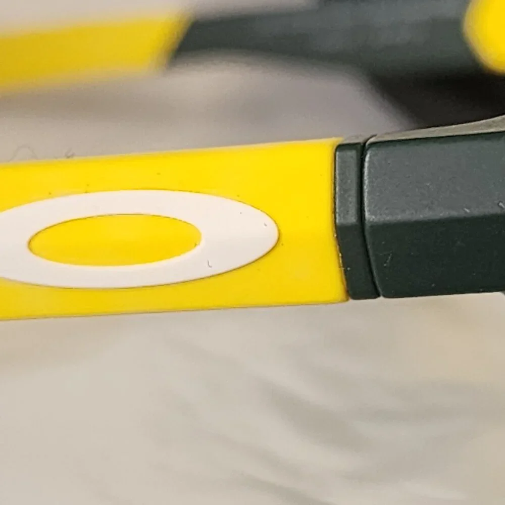 Oregon Ducks colored Oakley NWOT Tail whip satin finish green & yellow EYEGLASS